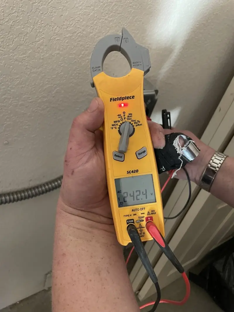 Voltage testing with clamp meter during Generator Installation in Farmersville